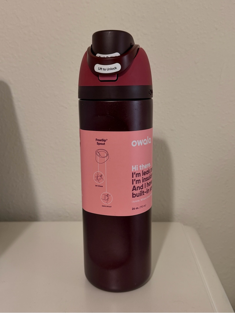 Owala FreeSip 24 oz. Stainless steel water bottle in Black Cherry